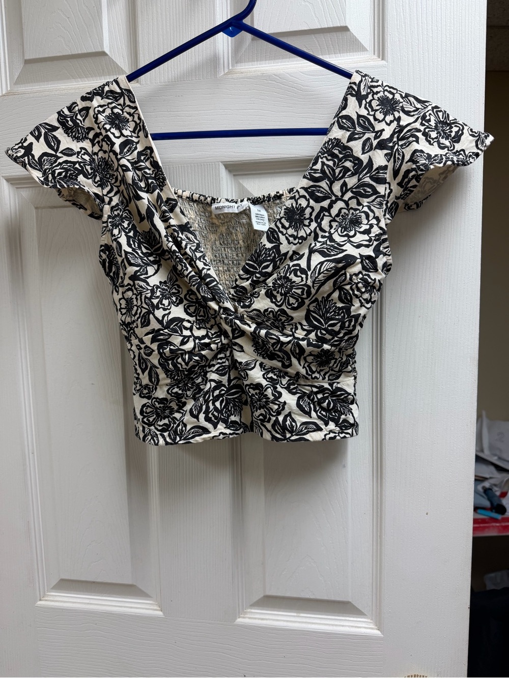 Twist-Front Floral Crop Top — Black on Cream